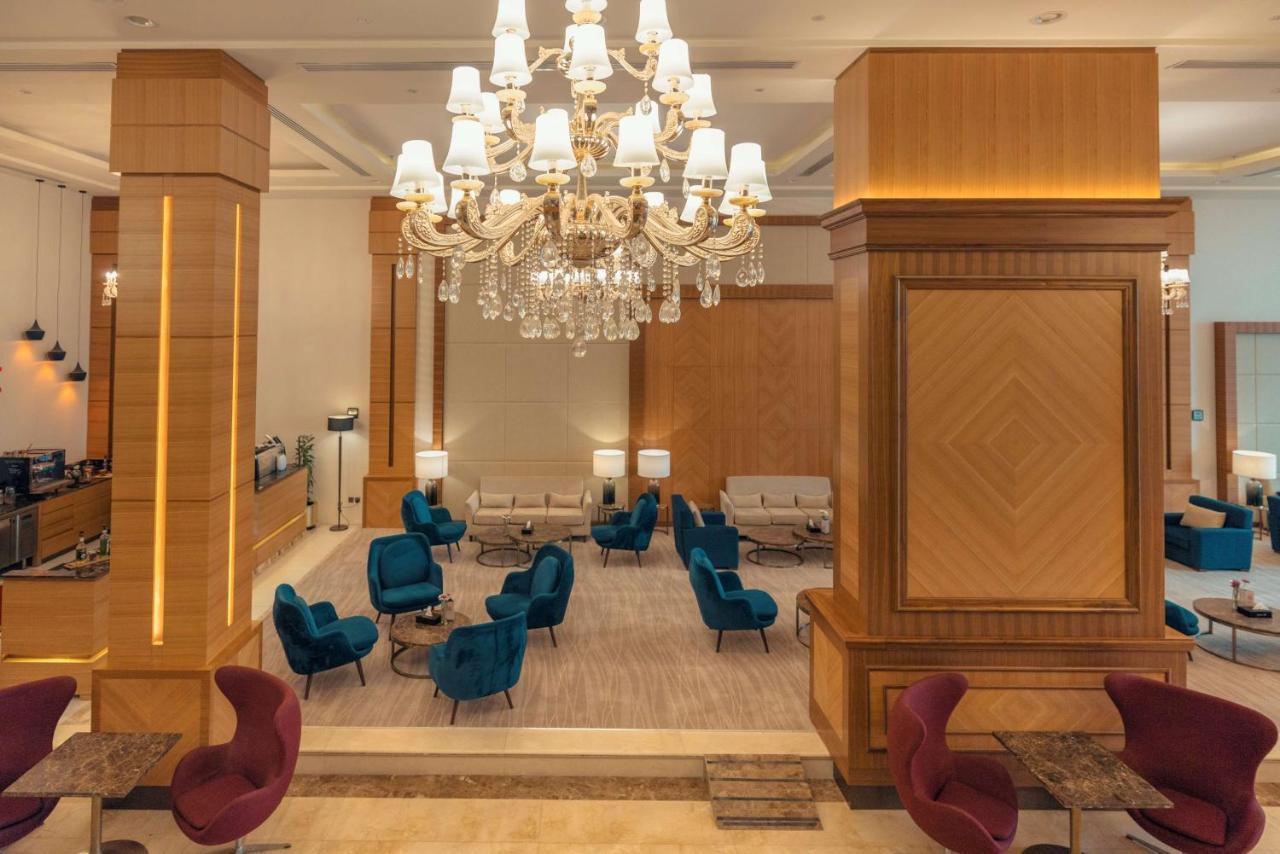 Radisson Blu Hotel, Бурайда Экстерьер фото